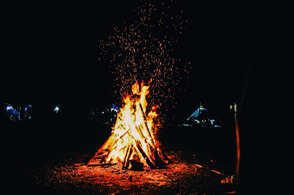 A campfire, the first source of artificial light.